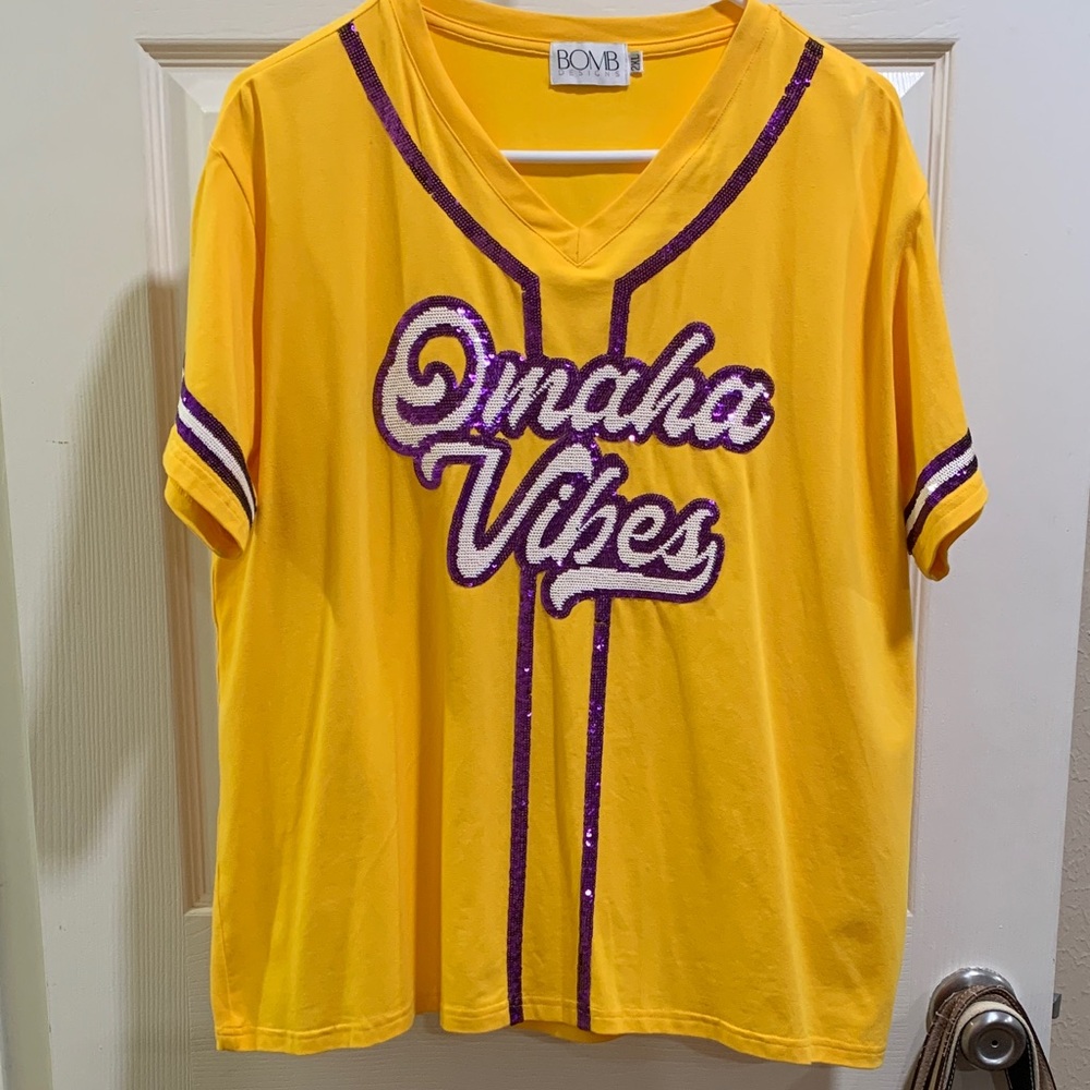 See sizing chart. Omaha vibes